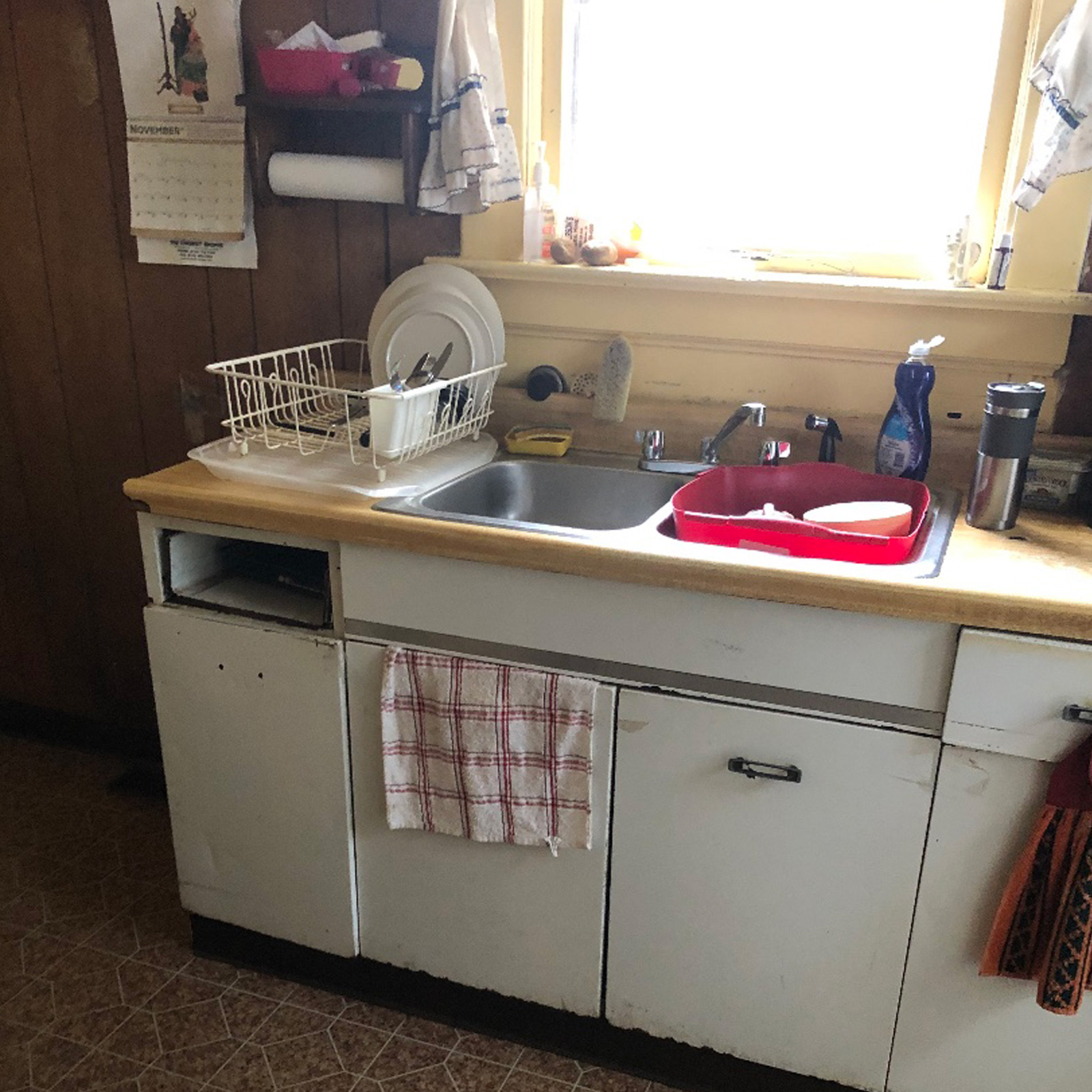 Entry 28 - These worn out cabinets definitely need to be replaced